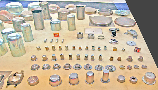 Estampos de repuxo com almofadas