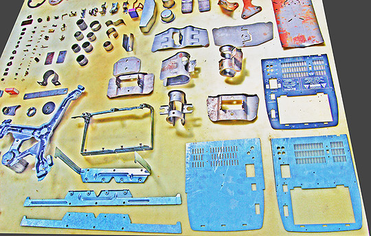 Estampos com gavetas e cunhas móveis para alta produção